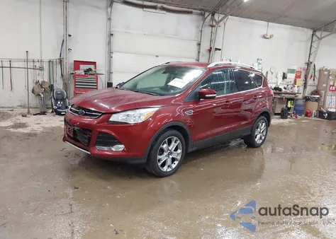 2016 Ford Escape Titanium z USA, uszkodzony, nr VIN 1FMCU9J94GUB12785
